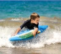 Surfer Student Riding the Waves